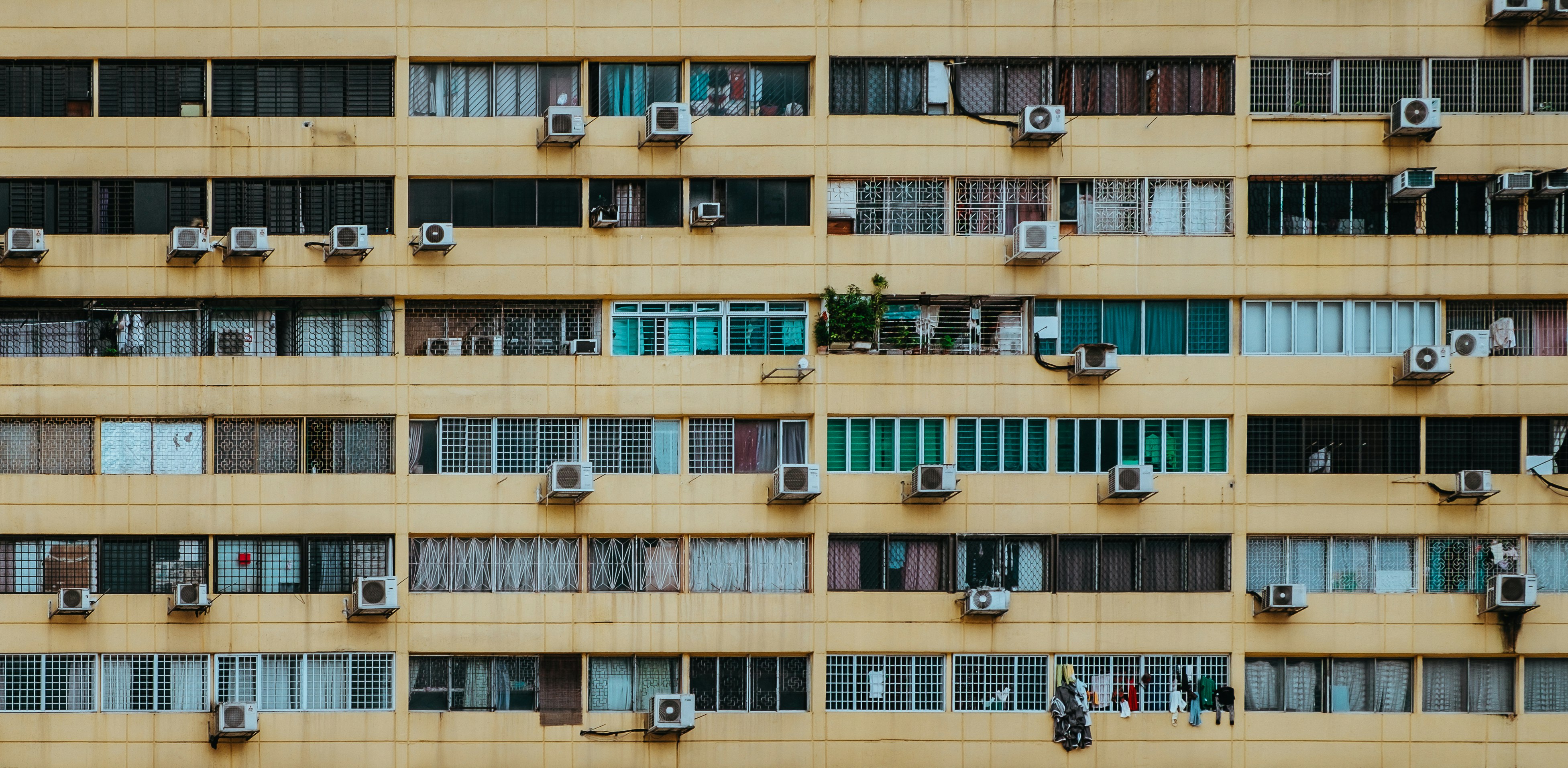 white home appliance hanging by building